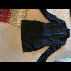 Black jacket and matching min skirt